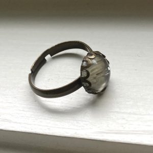 Rusty colored Brass ring with Genuine Zultanite Cabochon